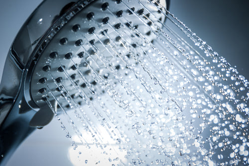 A Shower Head Spraying Water